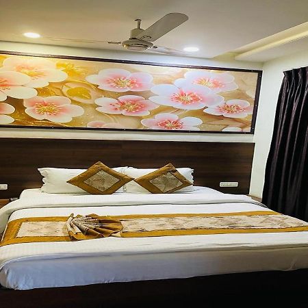 Hotel Babul Inn, Gondia Extérieur photo