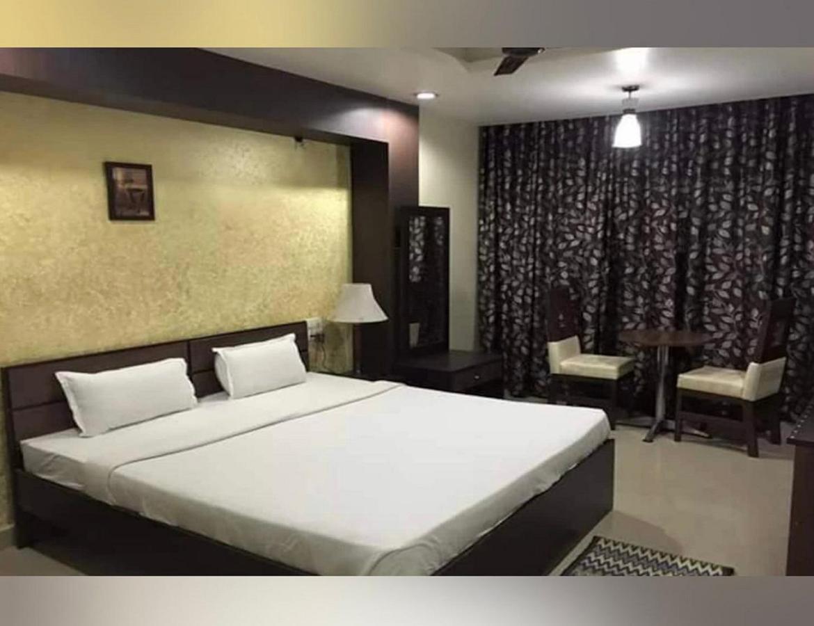 Hotel Babul Inn, Gondia Extérieur photo